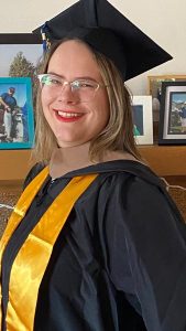 Michelle Ruszat Klee in her graduation cap and gown.