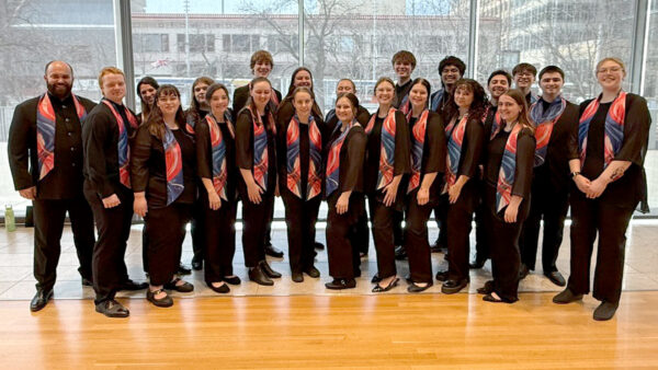 St. Scholastica's choral group led by Richard Carrick.