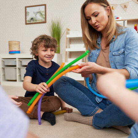 Teacher working with a student.