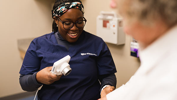 St. Cloud nursing student works with patient