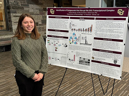 A St. Scholastica student presenting her research.