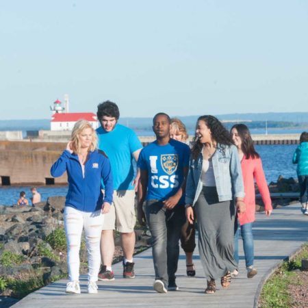 St. Scholastica students walking on the Lakewalk in Canal Park, Duluth, MN.