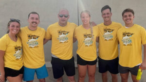 Macy Sunnarborg with a group of Veterans.