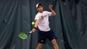 Junior Jonas Abeleda playing tennis