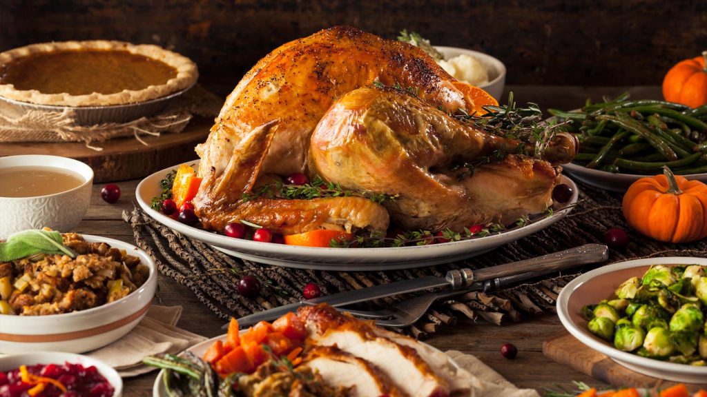 Thanksgiving Day dinner on a dining table.