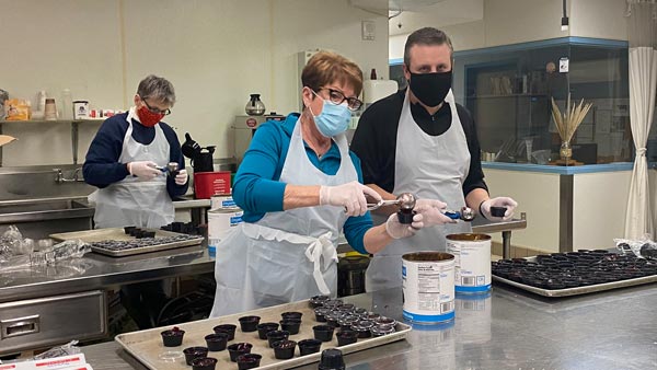 Volunteers preparing for the Thanksgiving Day Buffett.